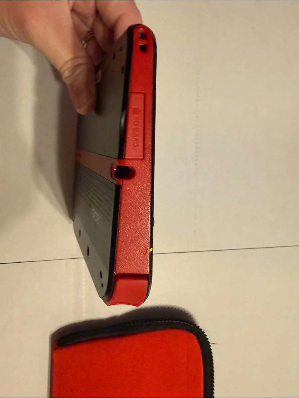 Nintendo Black 2DS XL with Red Nintendo Zip Case